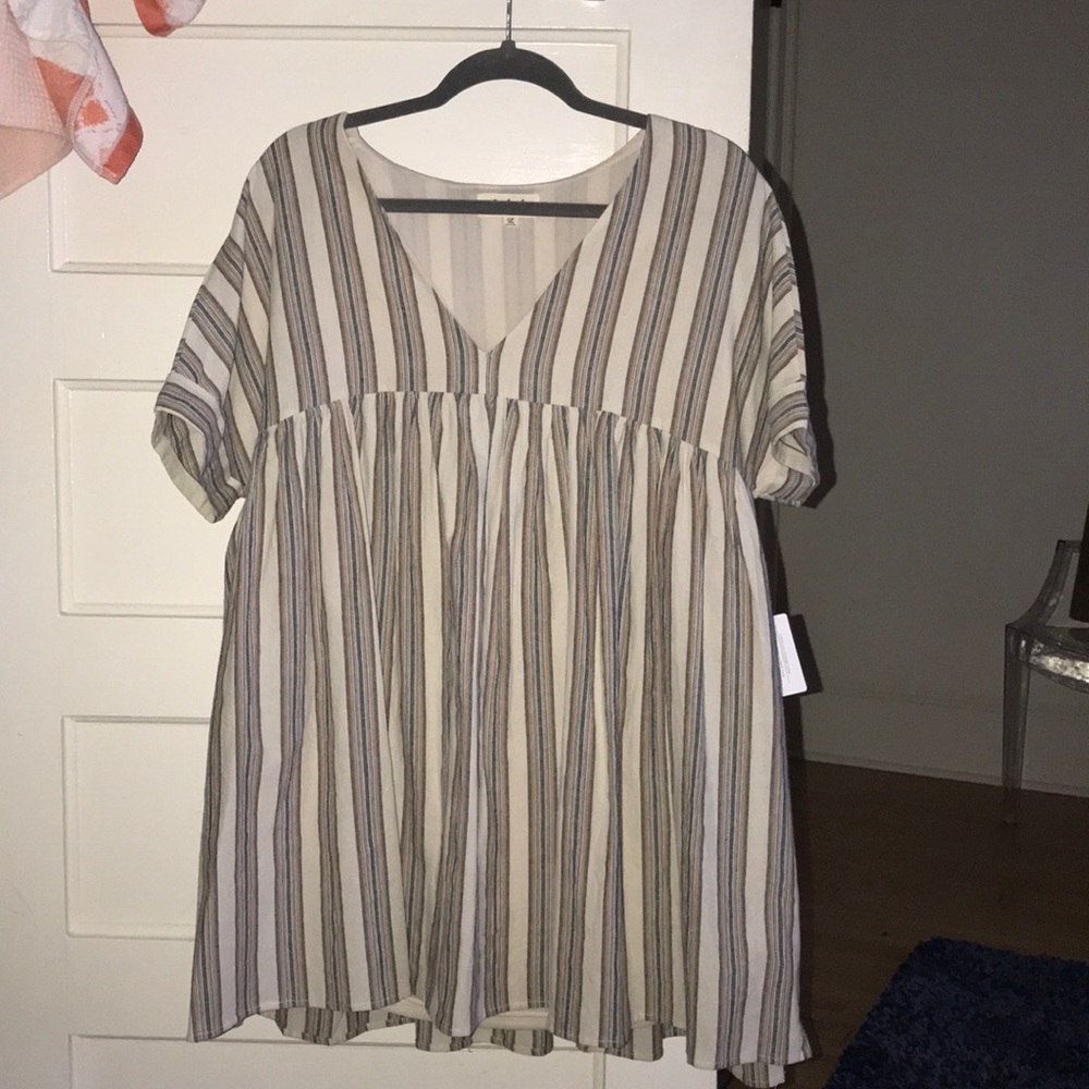 Cute dress for sale, never worn. Comes with tags.